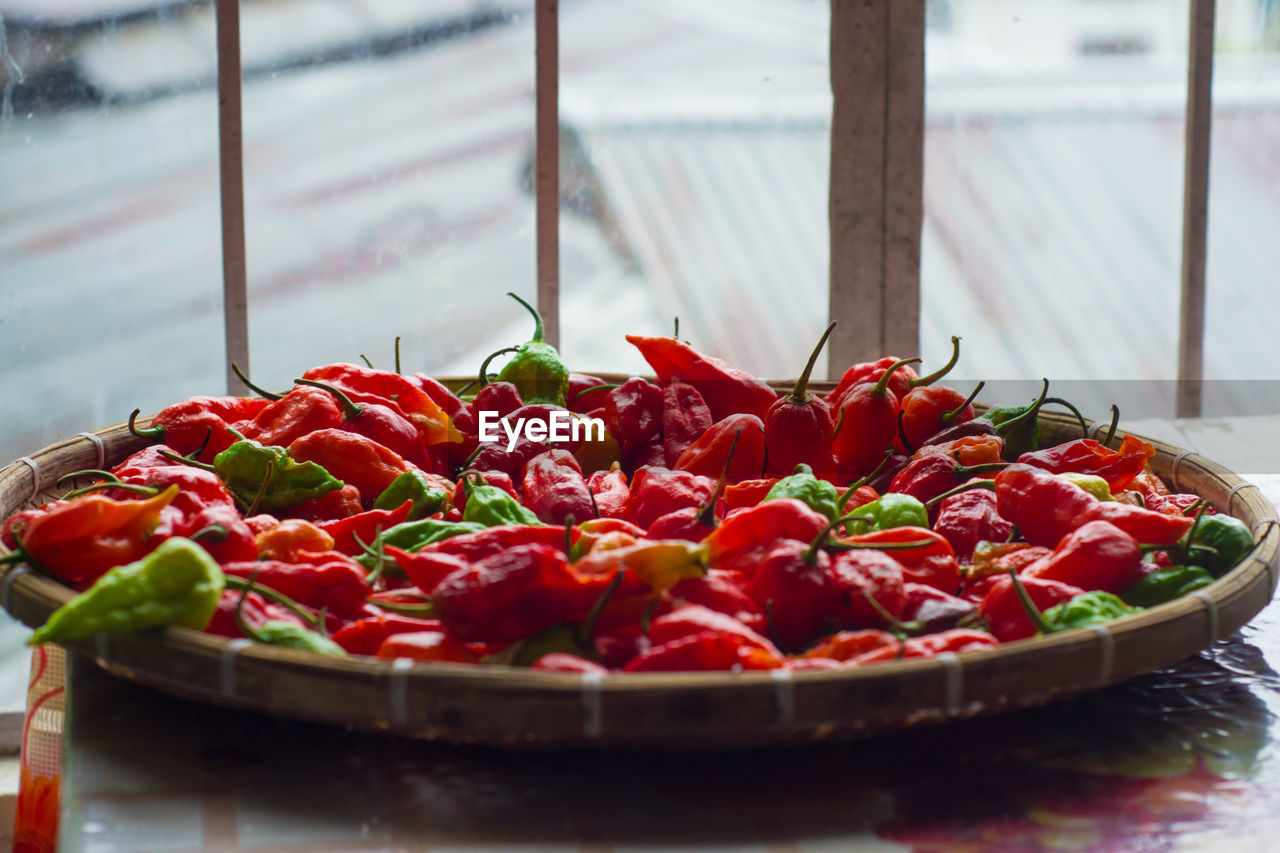 Peppers in basket at home