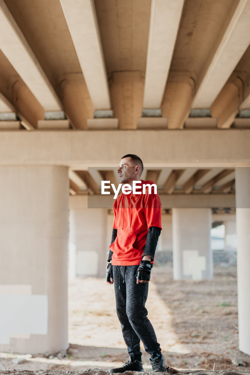 Young man in red hoodie. 