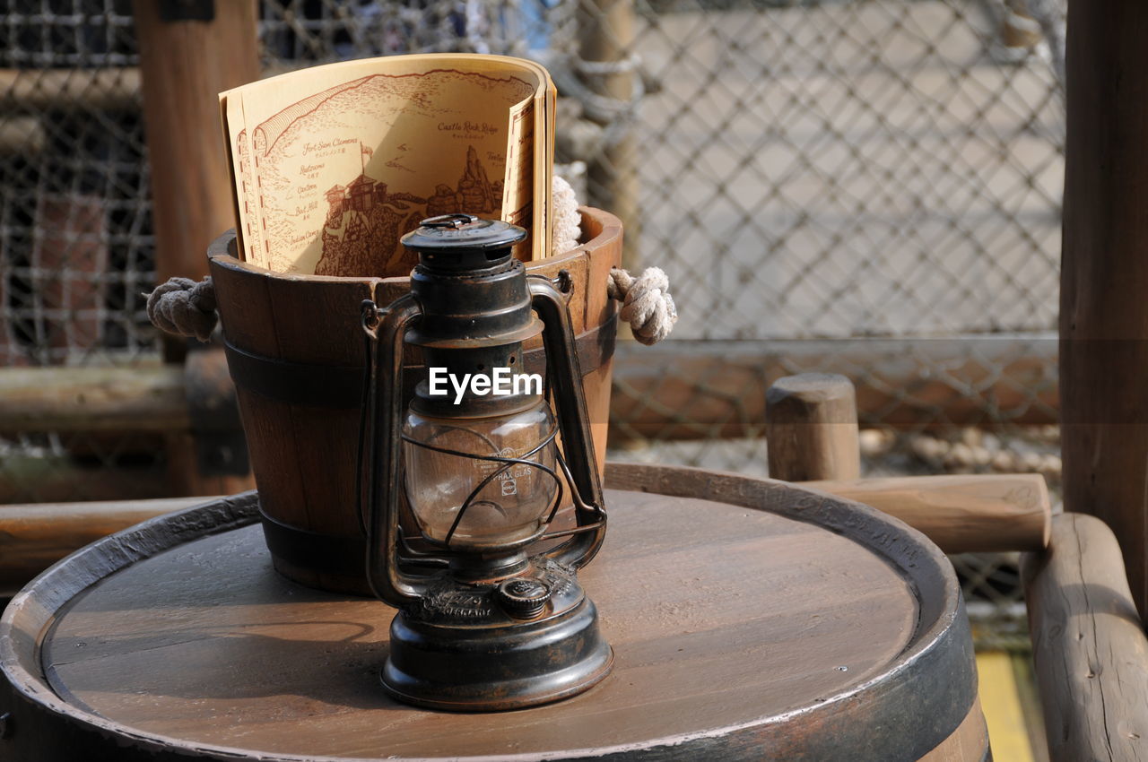 iron, metal, no people, lighting, focus on foreground, food and drink, wood, day, drink