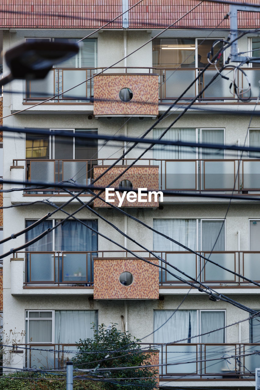 Combination of electric wires and buildings. scenery of the city of akasaka 8-chome, tokyo