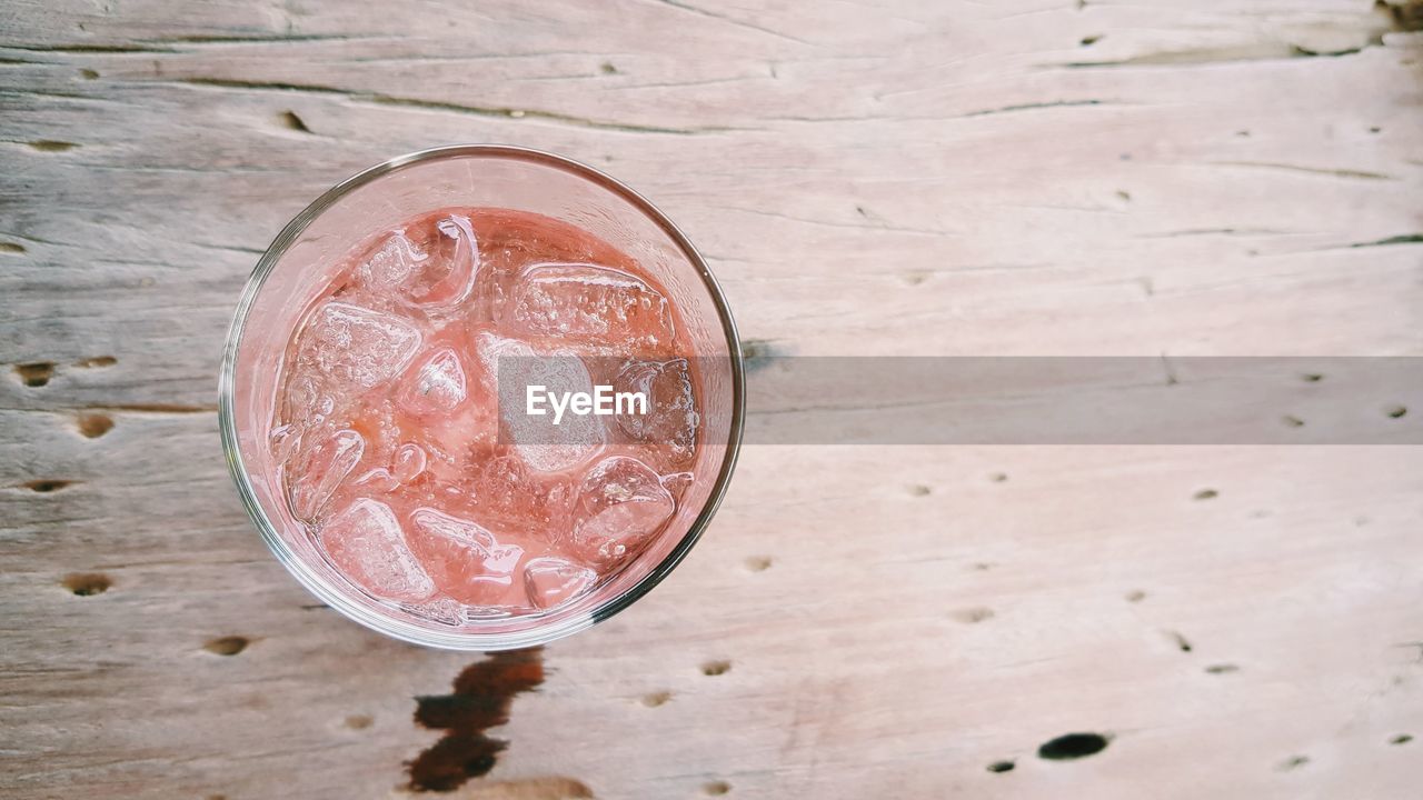 Pink drink on wooden table