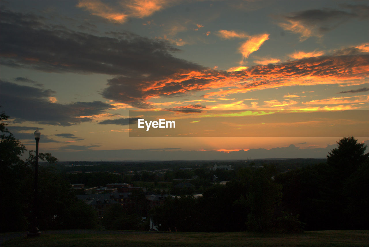 SUNSET OVER LANDSCAPE