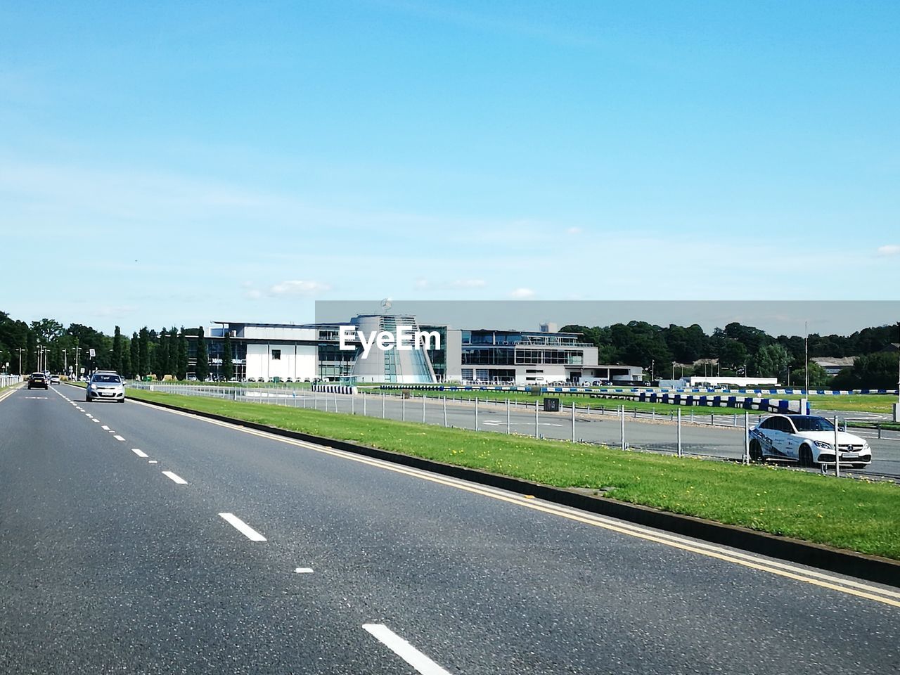 Road passing through against sky