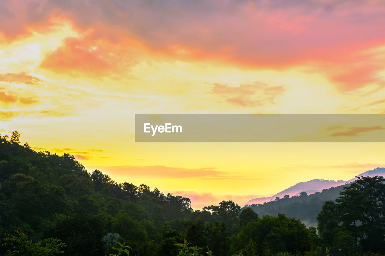 Scenic view of dramatic sky during sunset