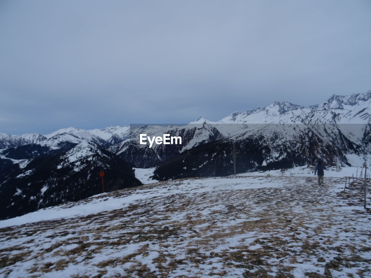 SNOW COVERED MOUNTAIN AGAINST SKY