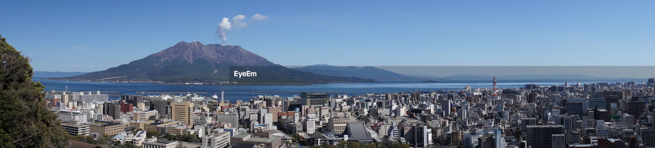 Panoramic view of sea and buildings in city