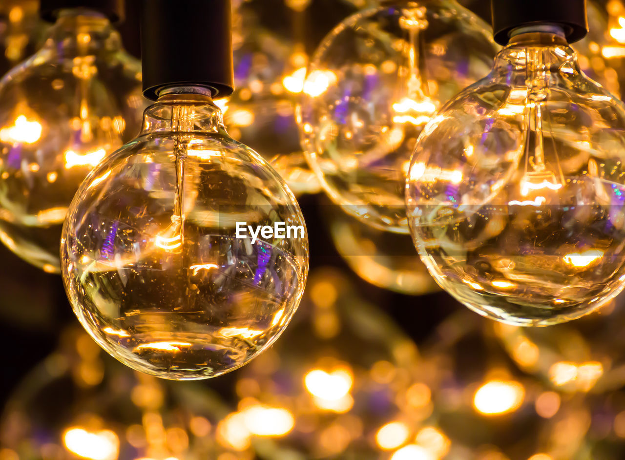 Close-up of illuminated light bulb