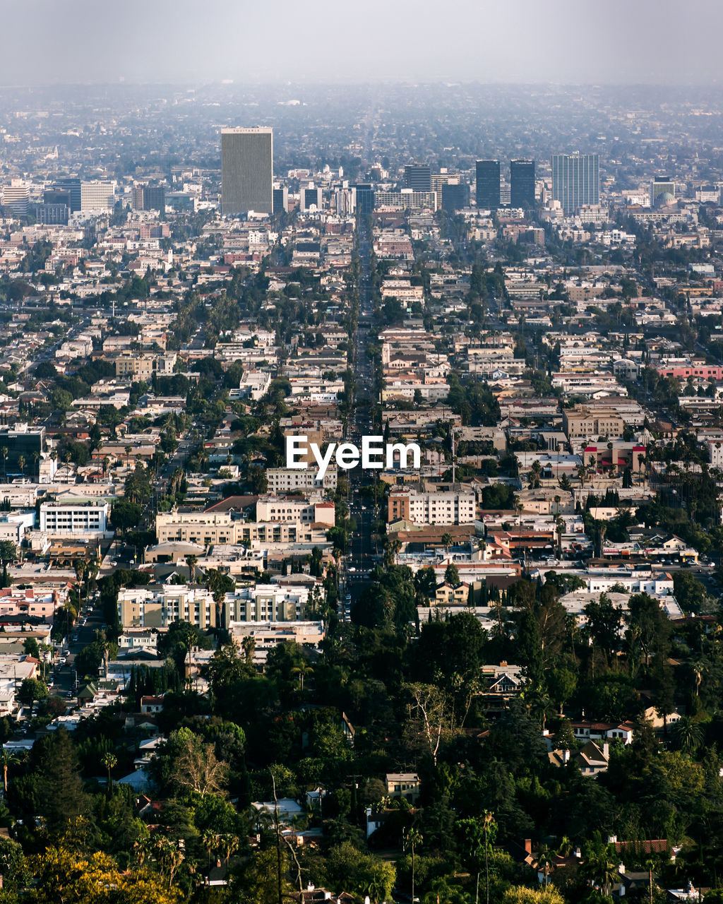 Aerial view of cityscape against sky