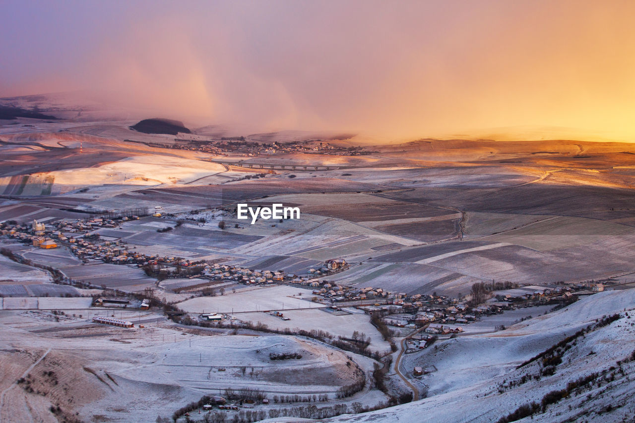 Aerial view of snow covered landscape