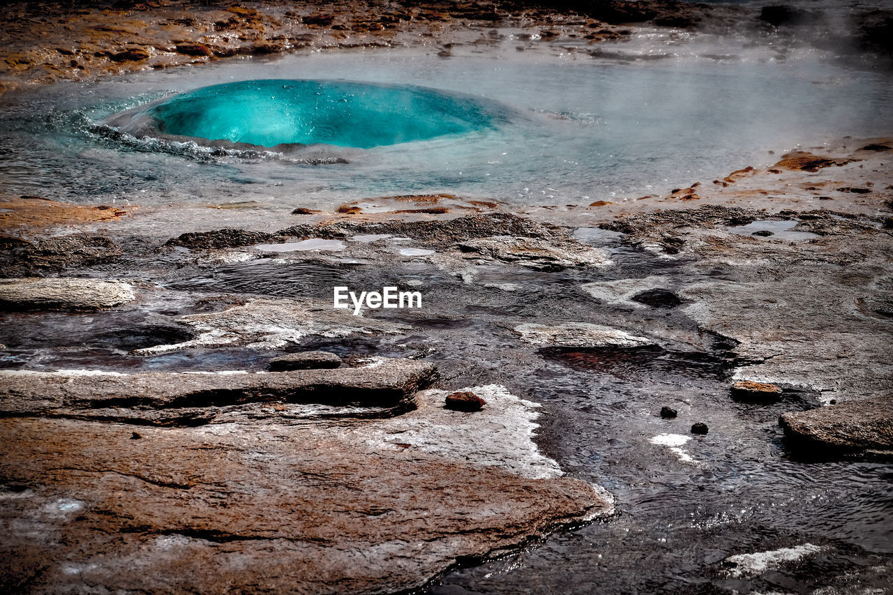 View of steam emitting from hot spring