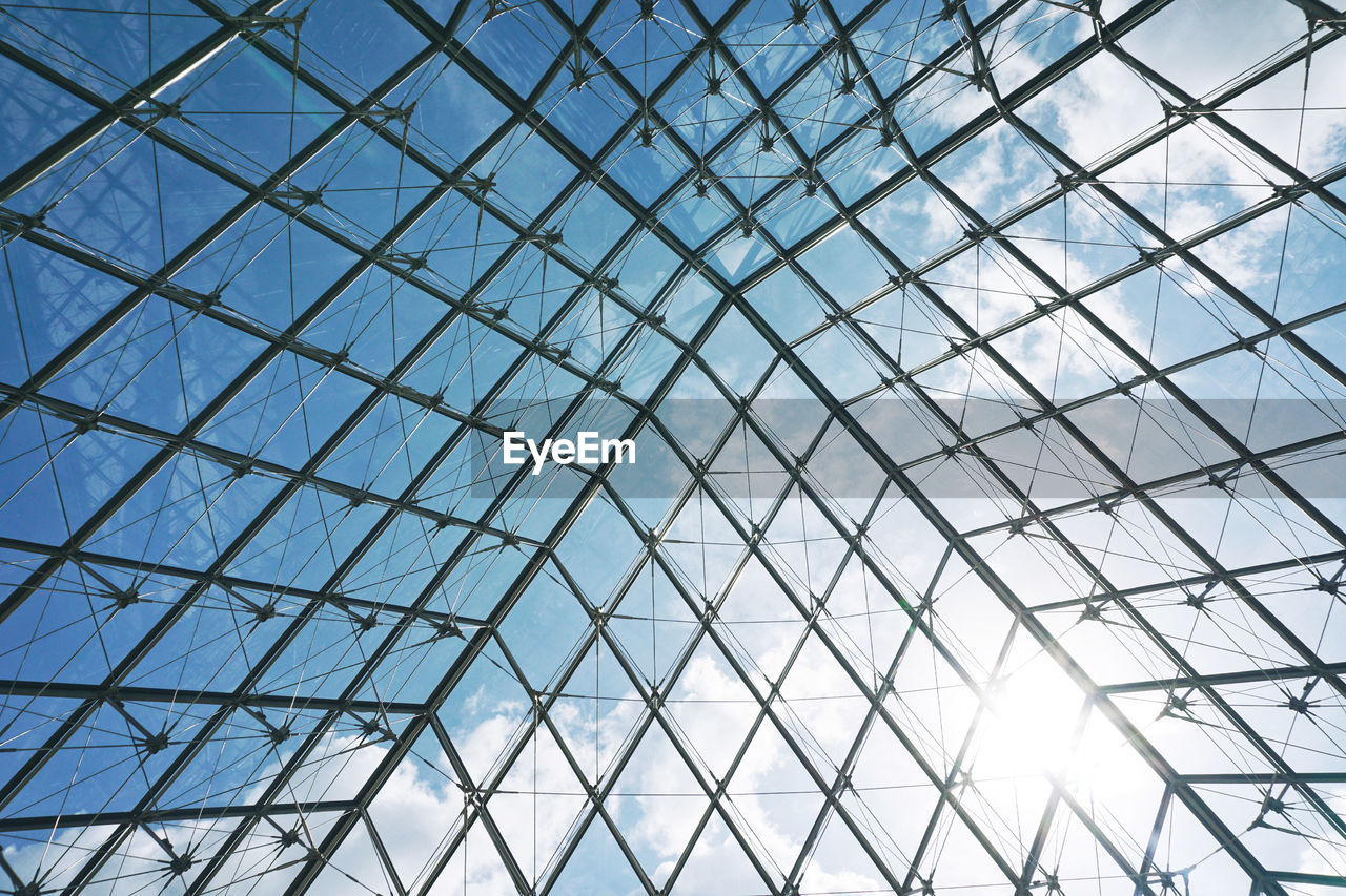 Louvre Pattern Full Frame Low Angle View Day Backgrounds Architecture Built Structure Sky Louvre Museum Blue Blue Sky Sun Building Triangle Shape Triangle Paris France Low Angle View Love Travel Photography Travel Illuminated EyeEm Selects EyeEm Best Shots