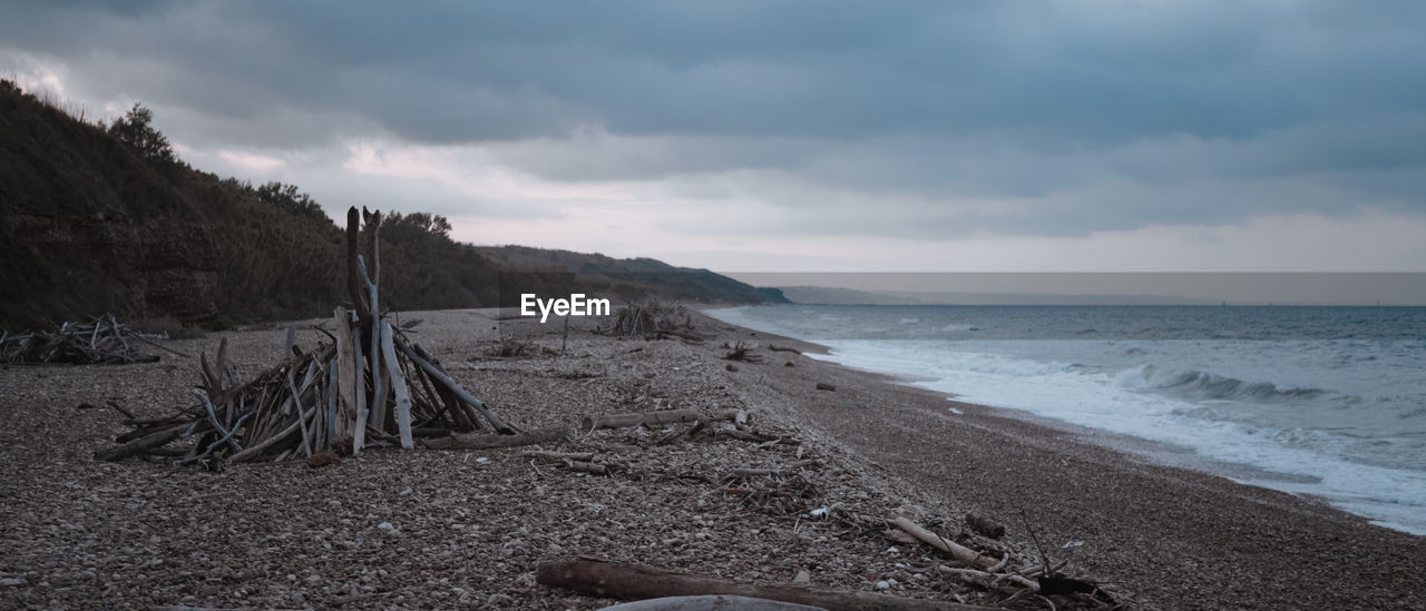 Scenic view of beach against sky