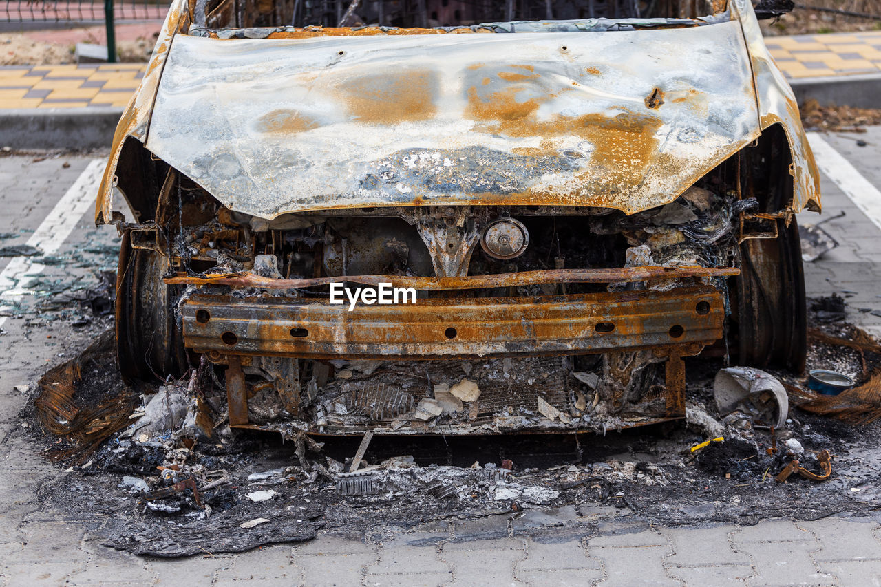 Shot cars. on the streets of irpin. cities of ukraine after the russian occupation. irpin, bucha,