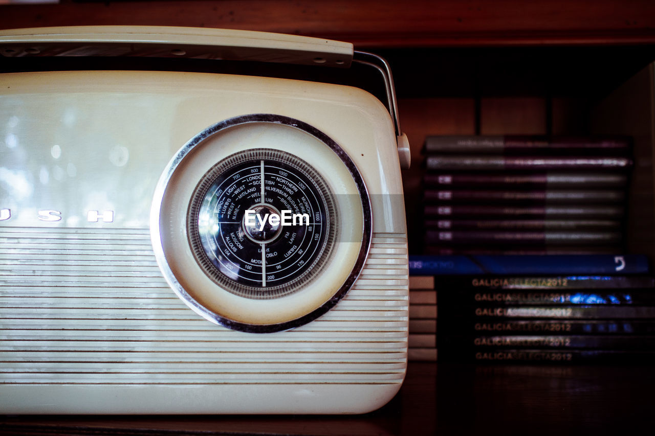 Close-up of vintage radio on table