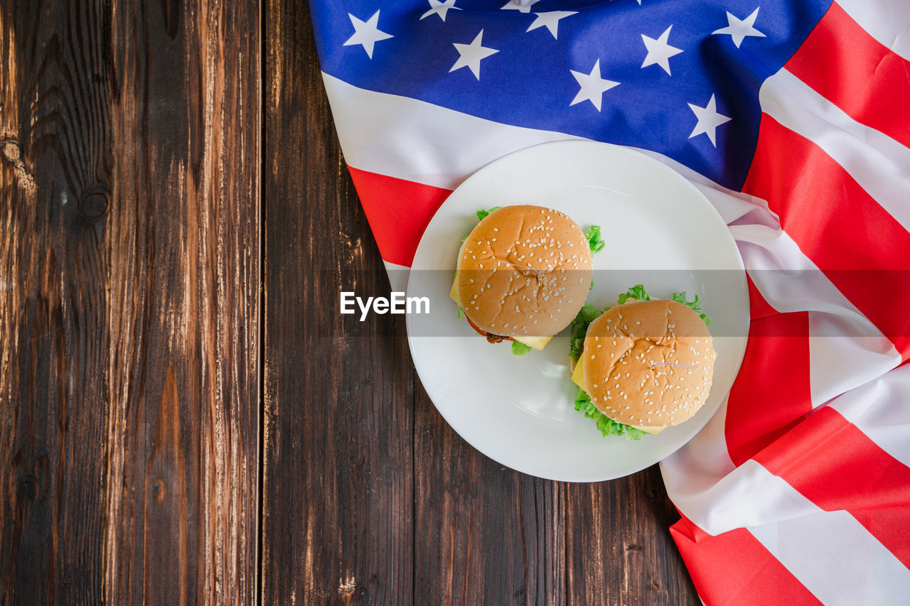 HIGH ANGLE VIEW OF FOOD ON WOODEN TABLE