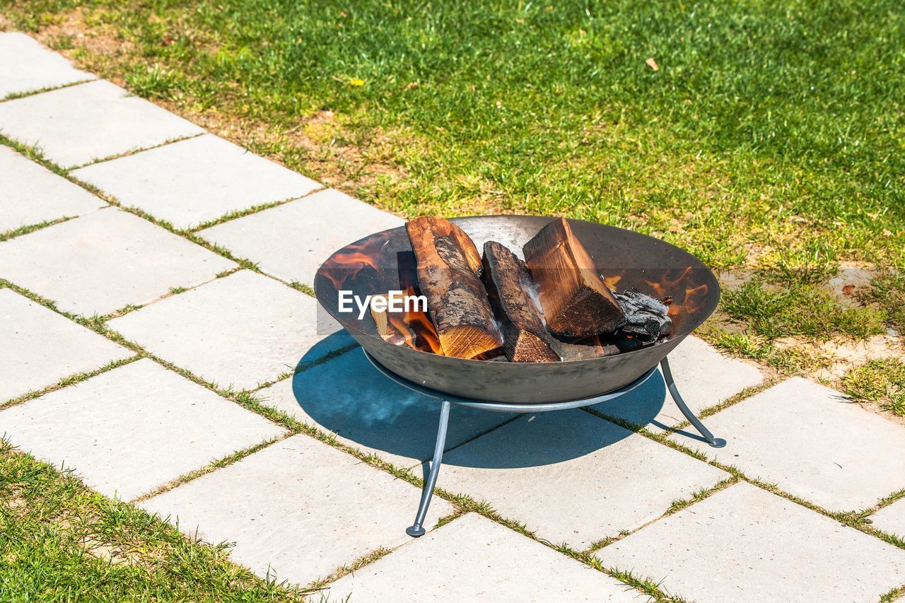 HIGH ANGLE VIEW OF VARIOUS FOOD ON BARBECUE GRILL