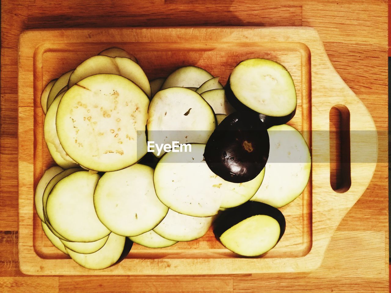 Directly above shot of sliced eggplant on cutting board