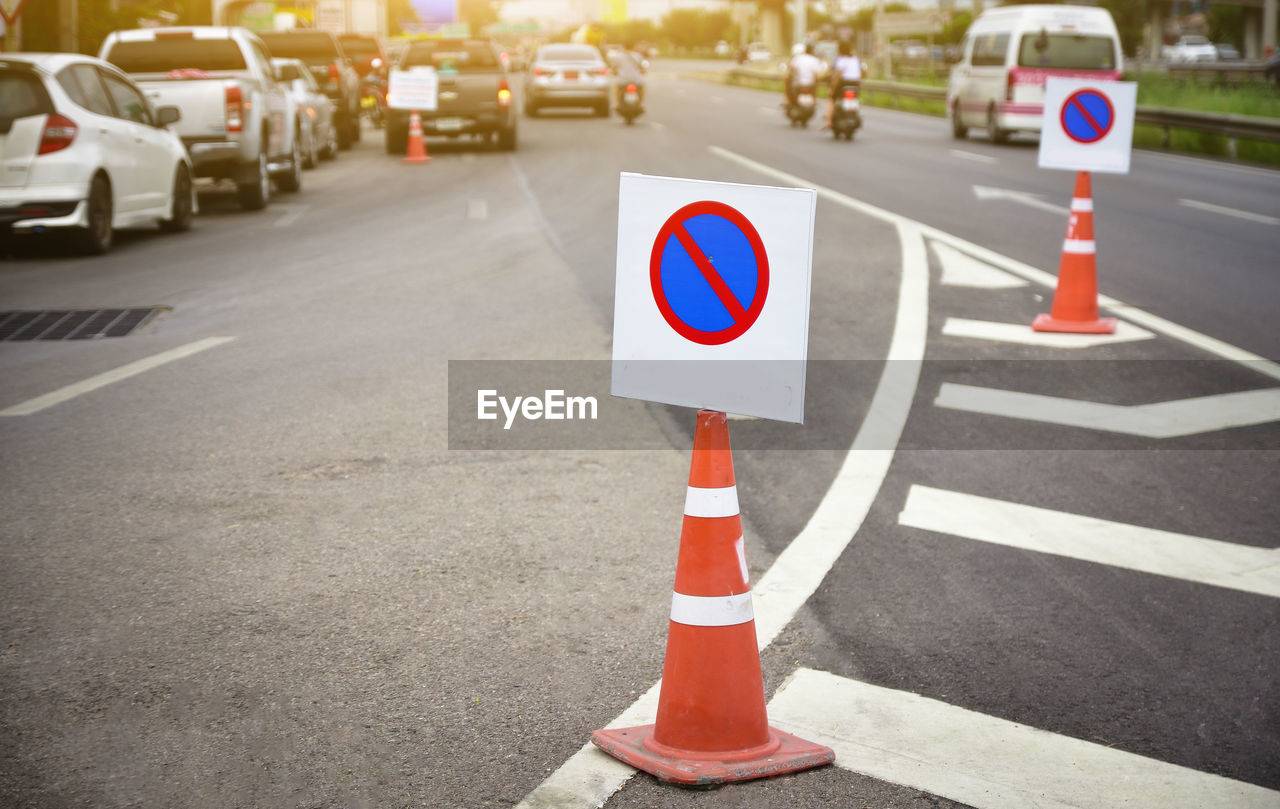 Road sign on street in city