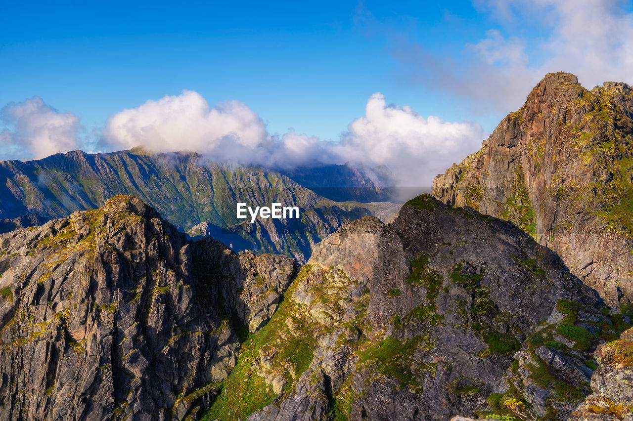 panoramic view of mountain range against sky