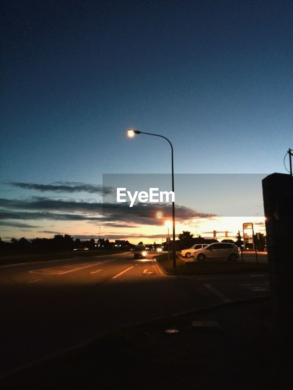 VIEW OF ROAD AT SUNSET