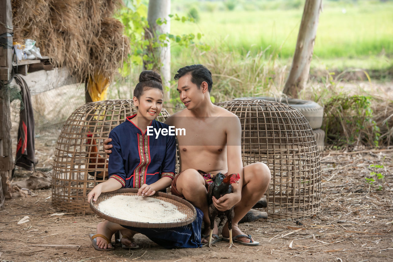 Pre wedding shoot inside garden in thai traditional dress costumes