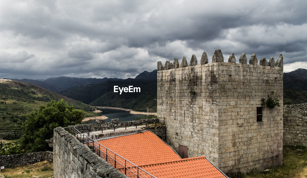 Building in peneda-geres national park against cloudy sky