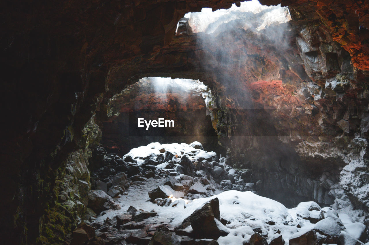 VIEW OF CAVE IN FOREST