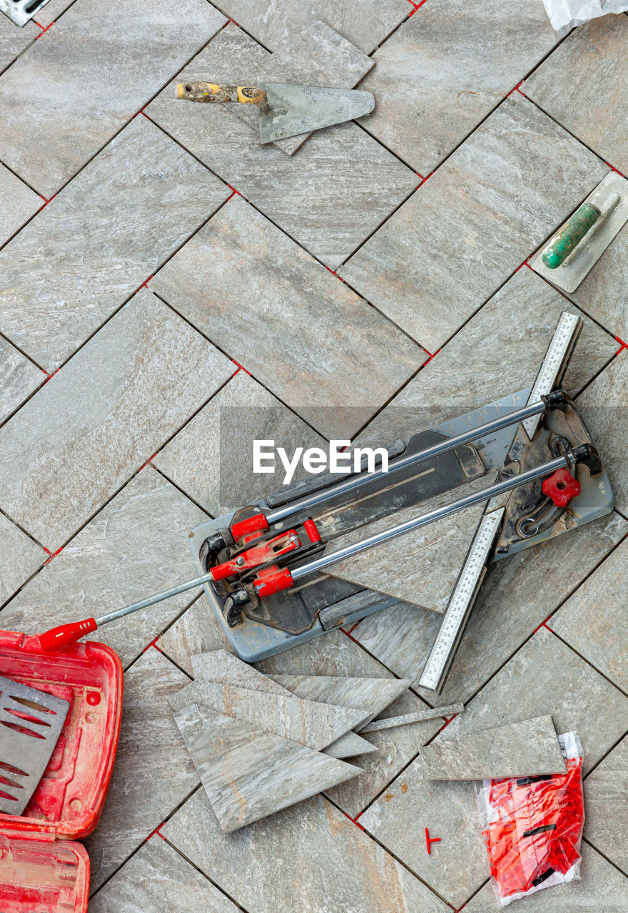 high angle view of work tools on street