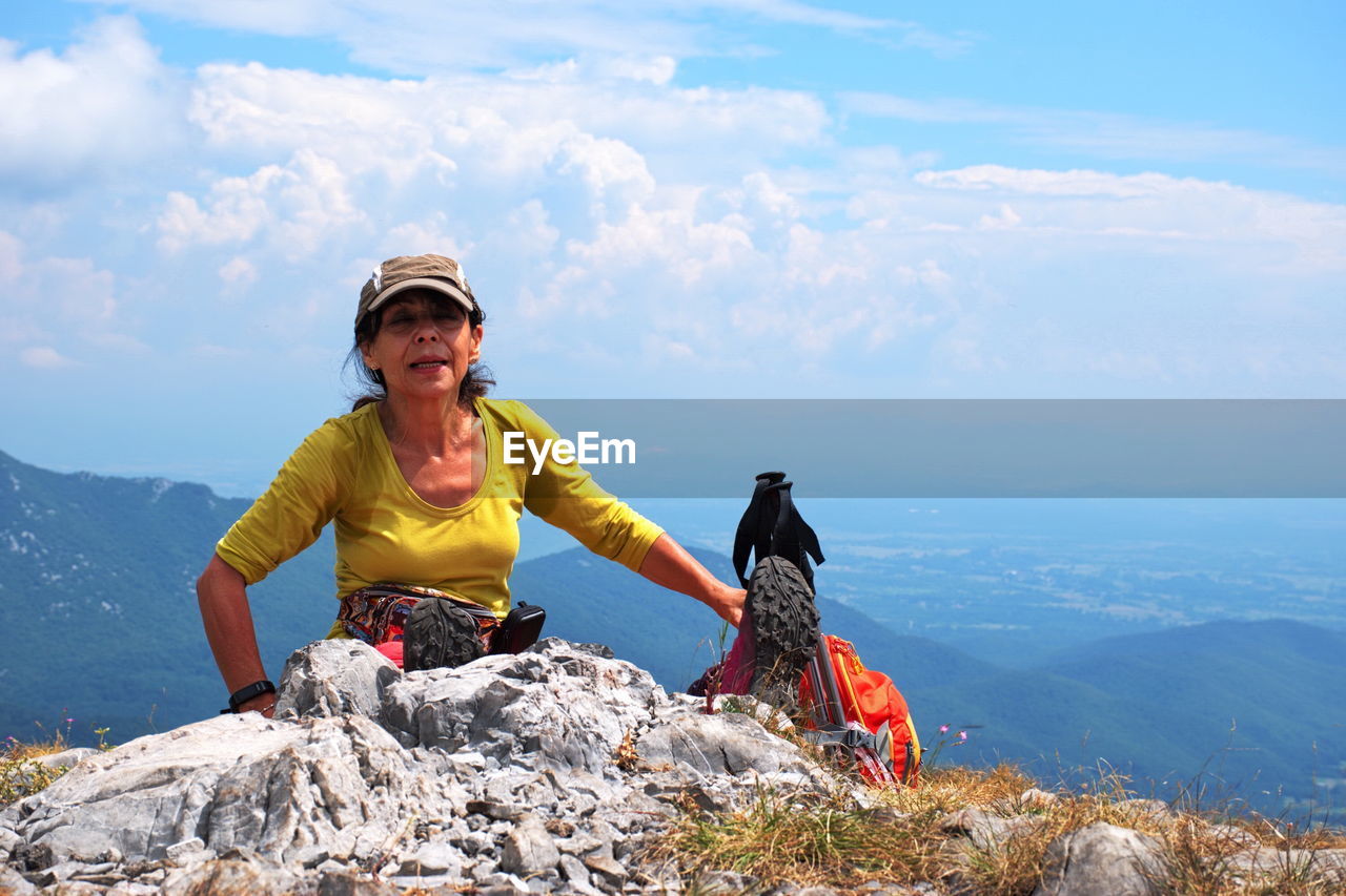 Portrait of senior woman hiking in velebit mountain, croatia