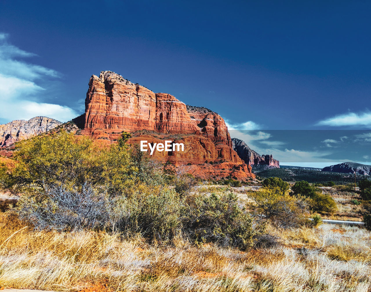 Rock formations on landscape against sky