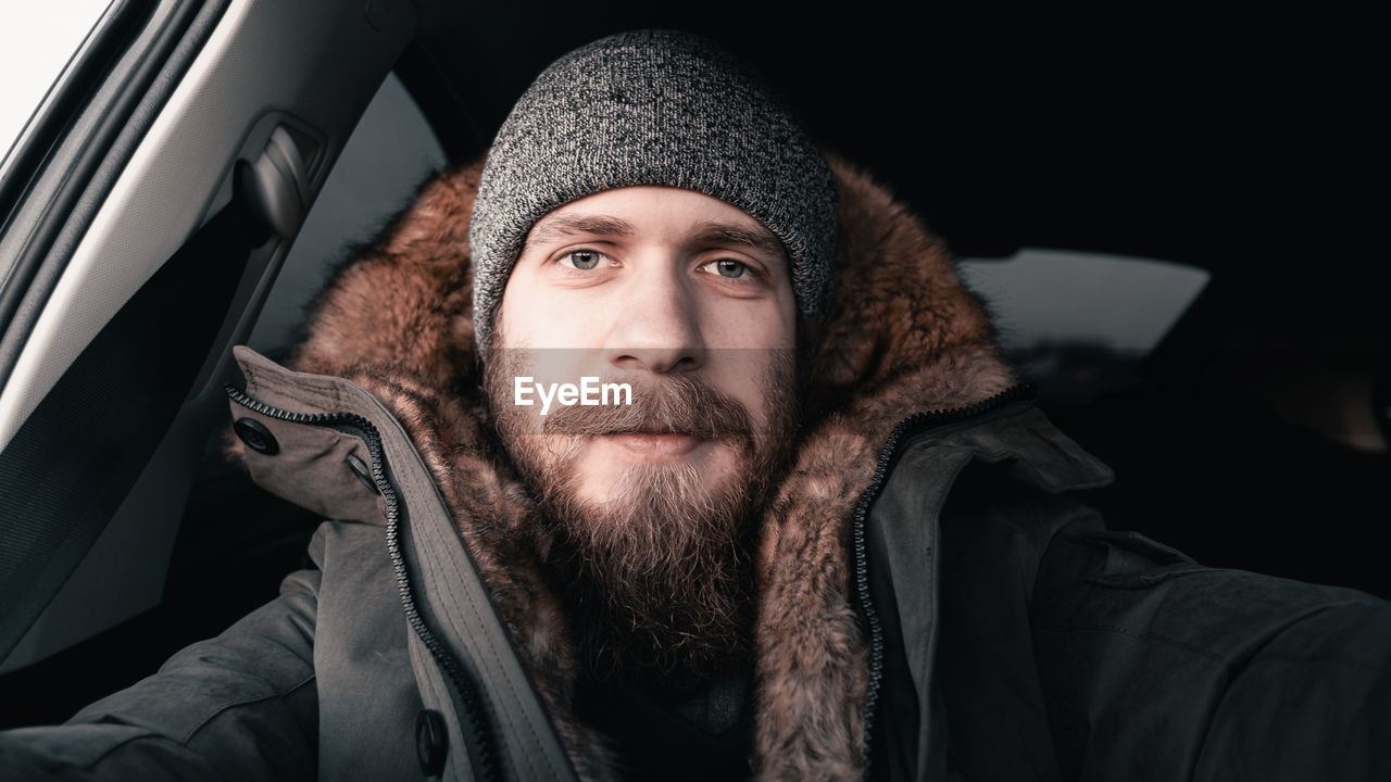 Portrait of man in park during winter