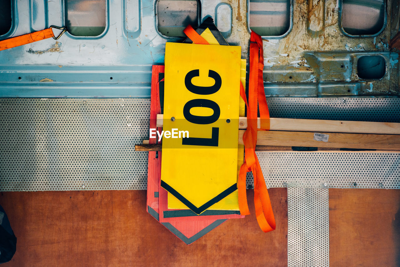 Close-up of road sign on machinery