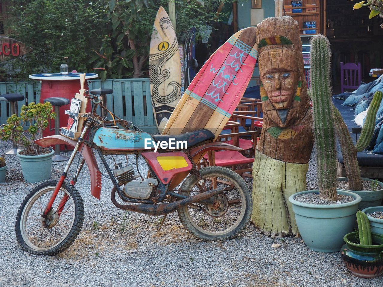 Close-up of abandoned motorcycle on street