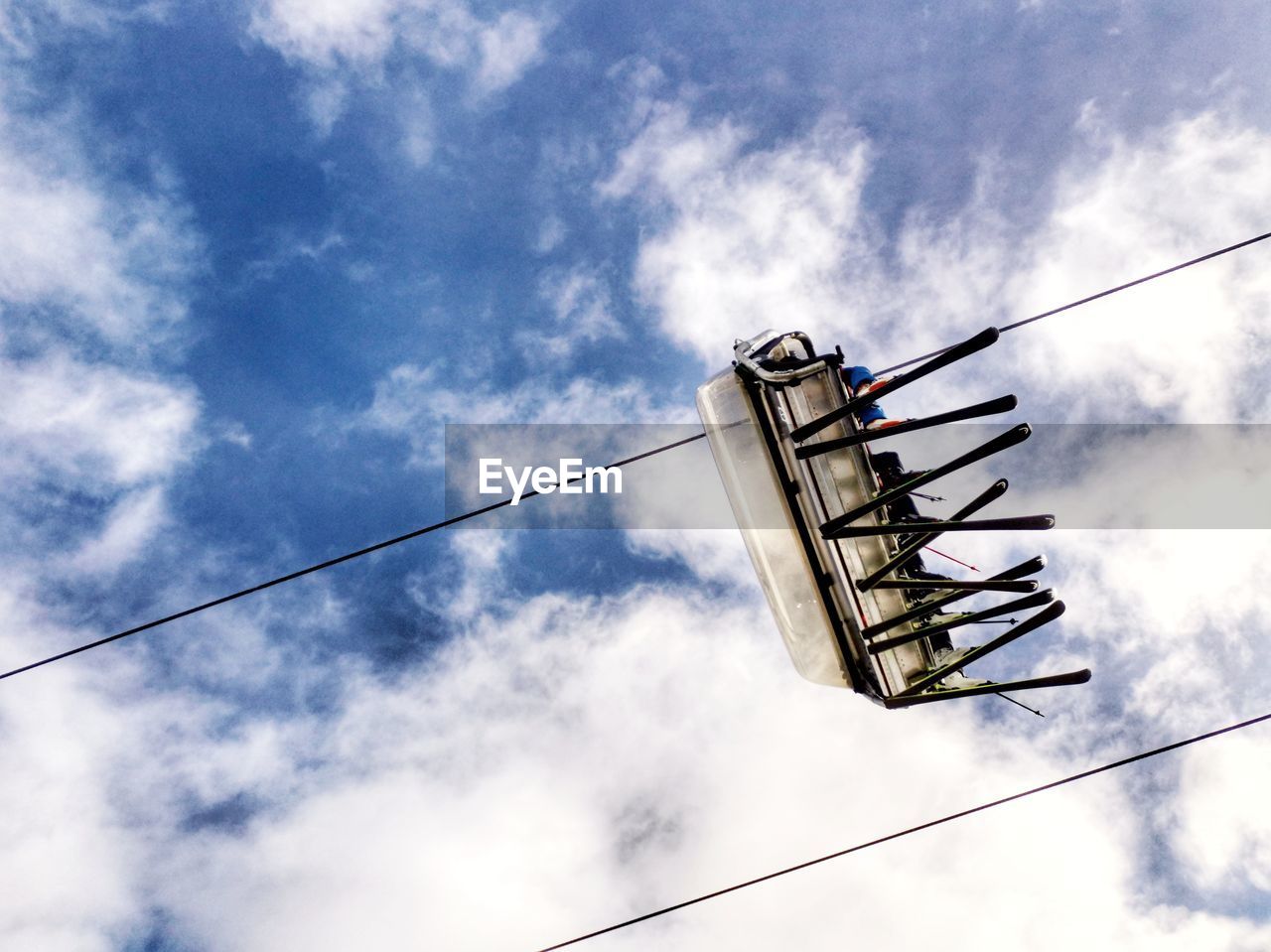 LOW ANGLE VIEW OF TELEPHONE POLE AGAINST SKY