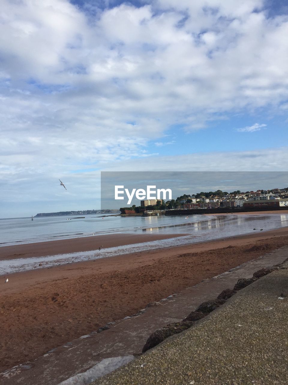 BEACH AGAINST SKY