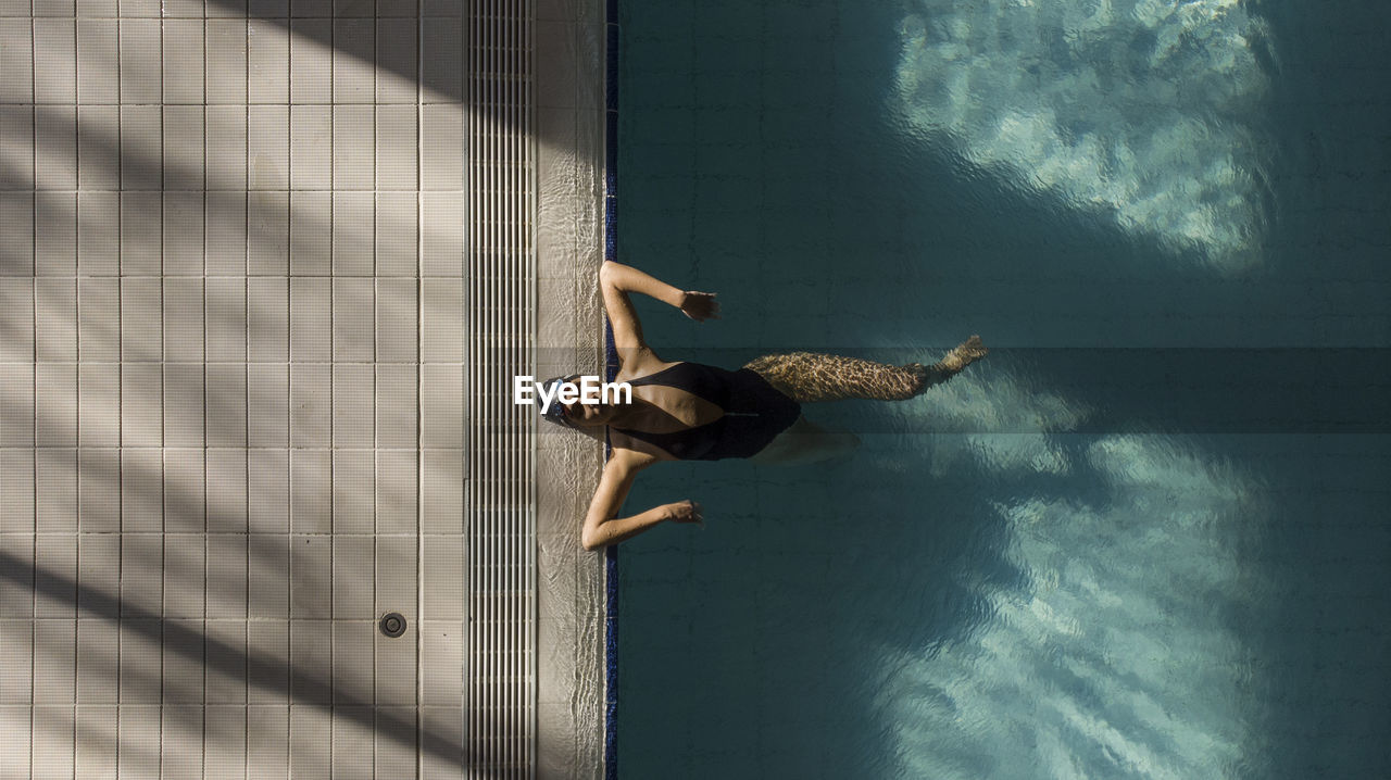 Woman swimmer in the pool