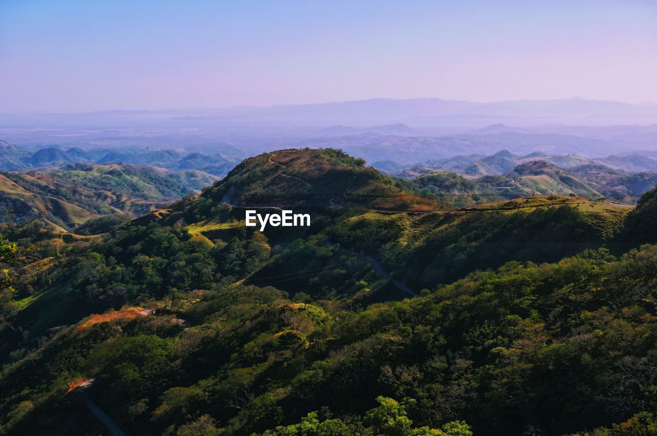 Scenic view of landscape against sky during sunset