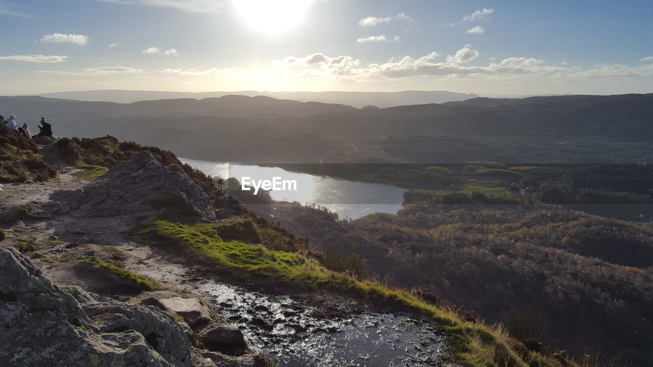 Scenic view of landscape against sky during sunset