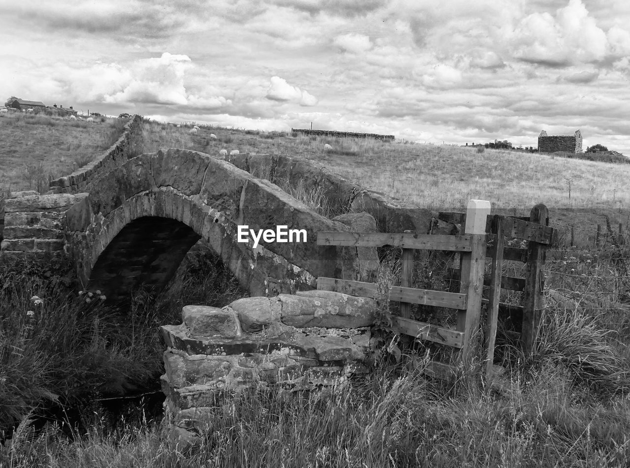 Bridge over landscape against sky