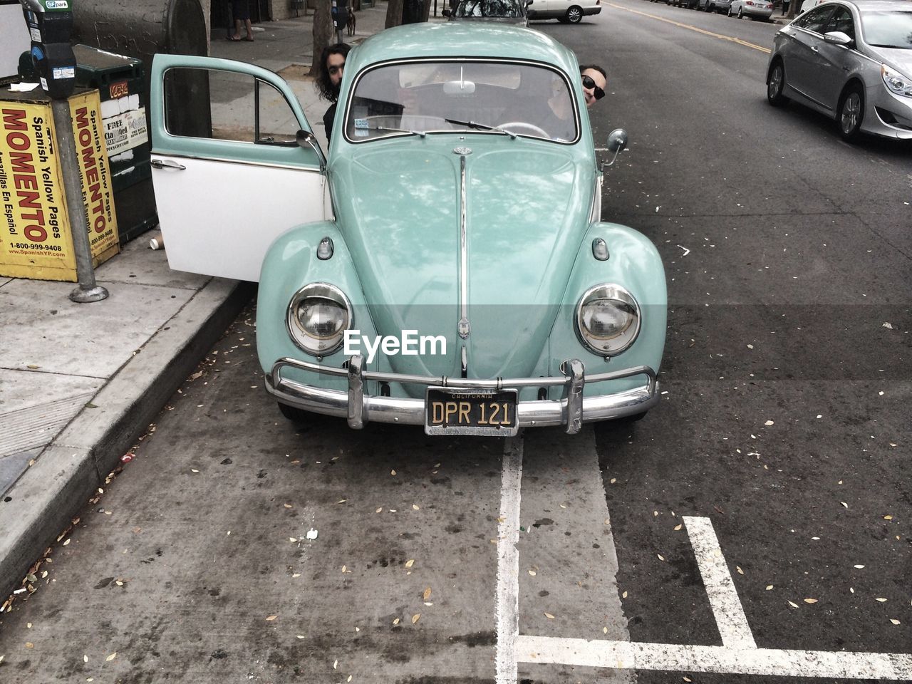 VIEW OF CAR ON ROAD