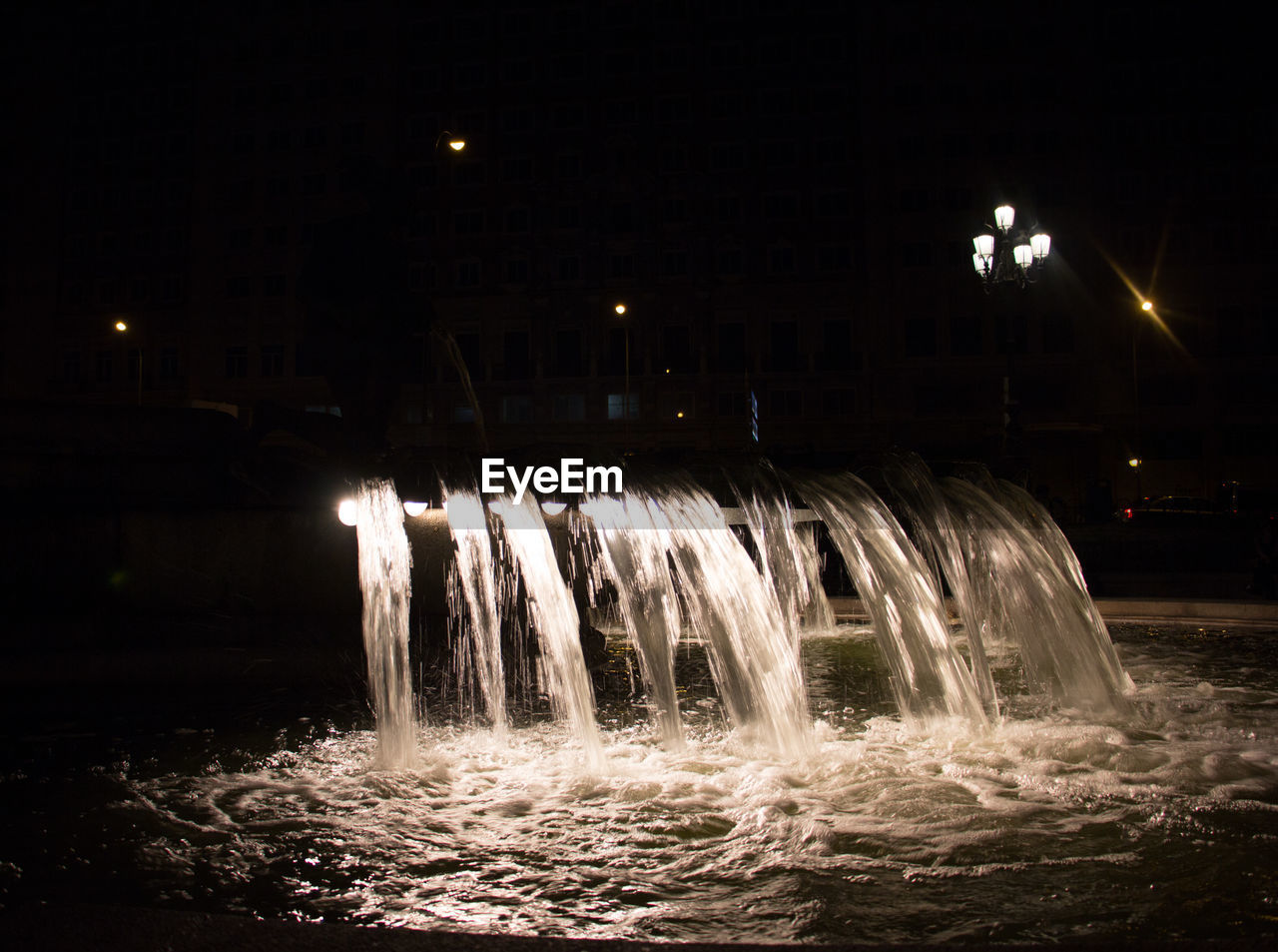 VIEW OF WATERFALL IN THE DARK