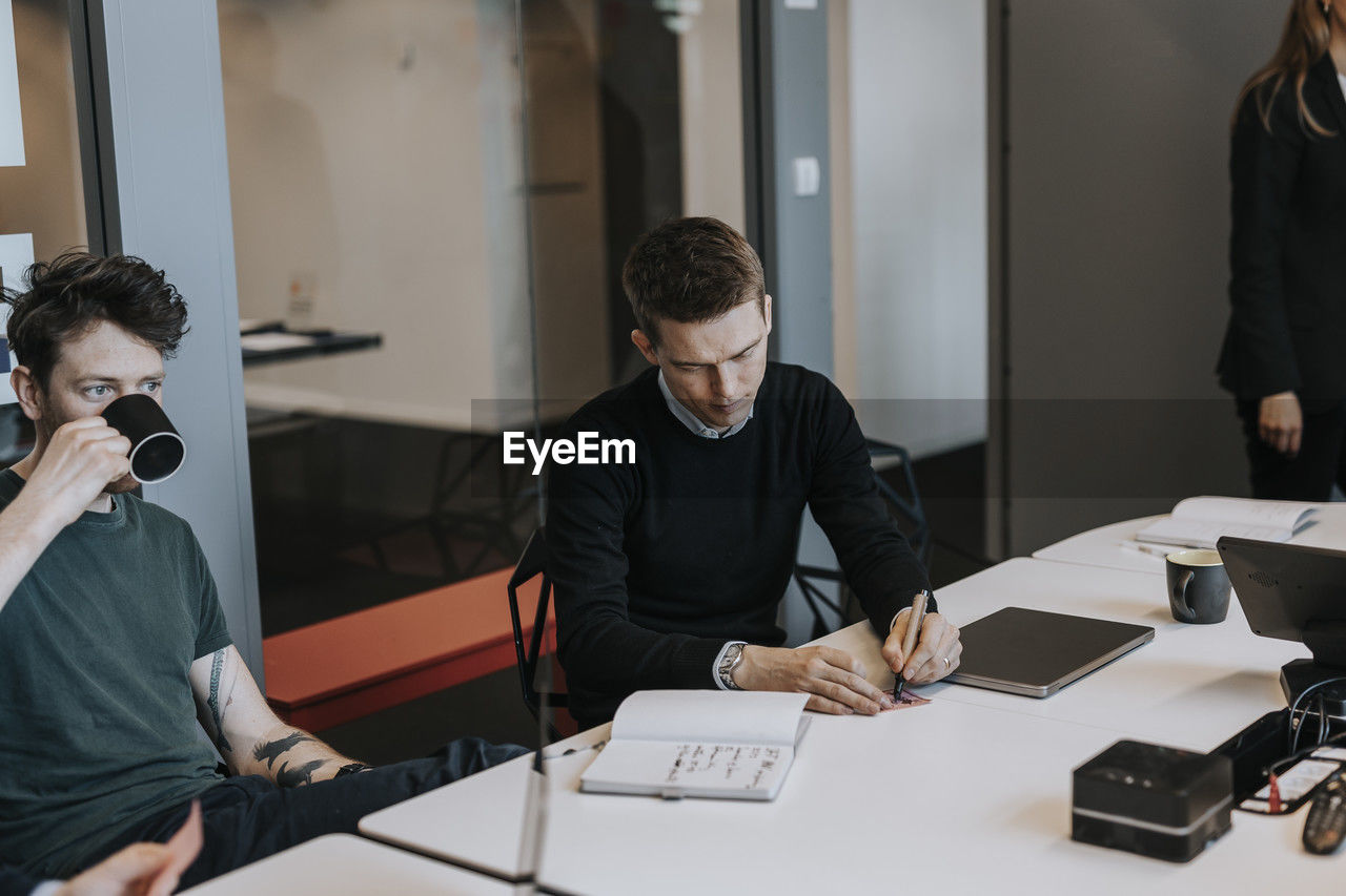 People sitting during business meeting