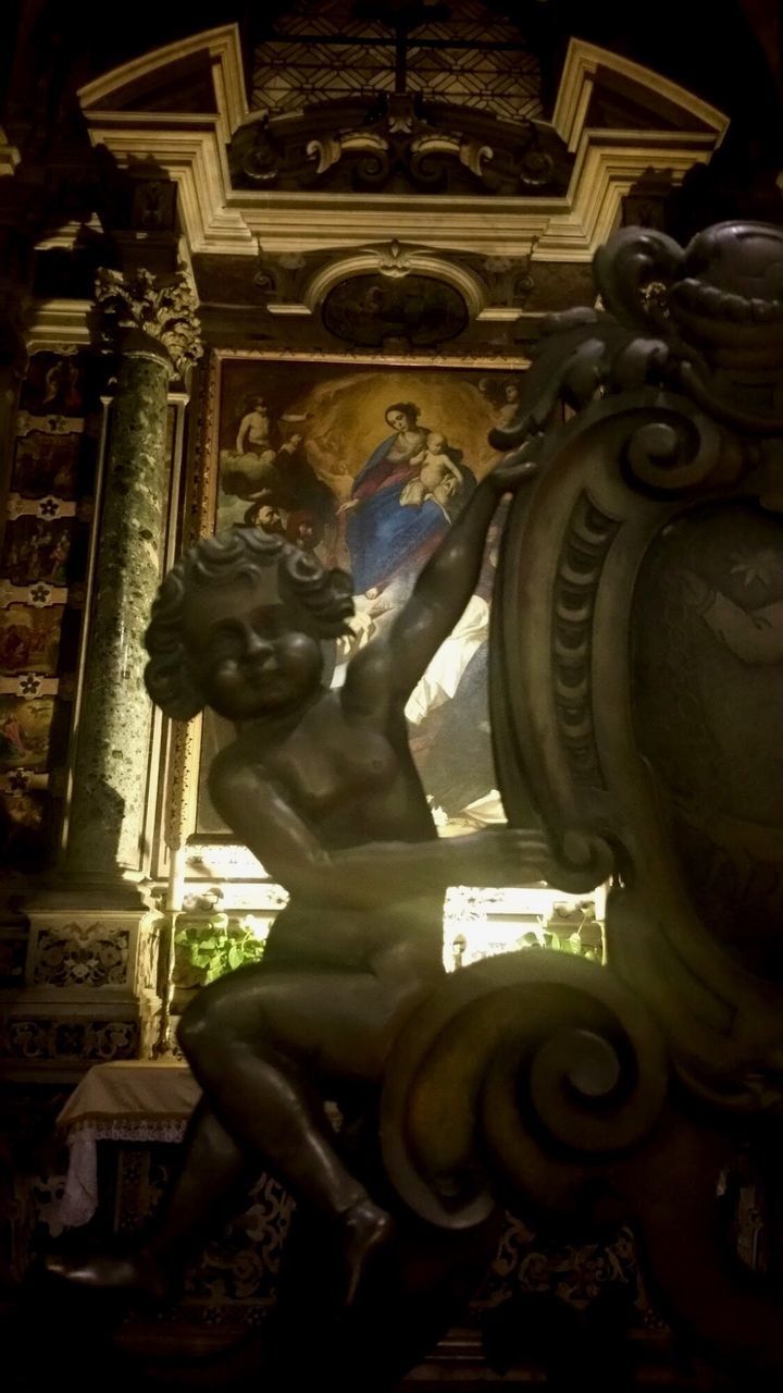 LOW ANGLE VIEW OF STATUE OF BUDDHA