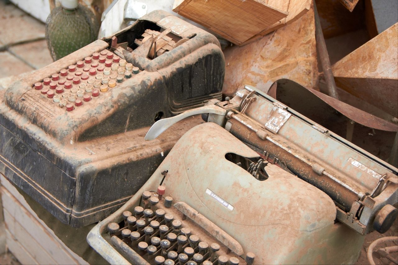 High angle view of abandoned typewriters