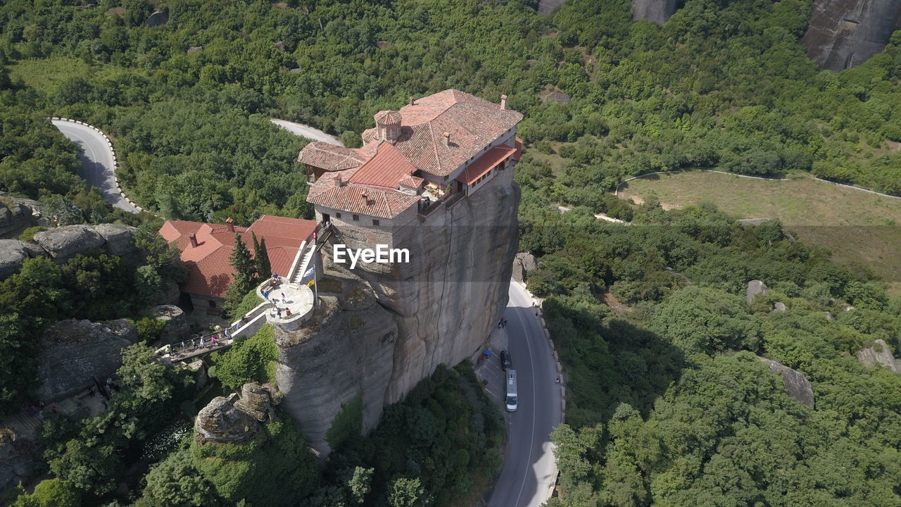 HIGH ANGLE VIEW OF BUILDINGS AND TREES