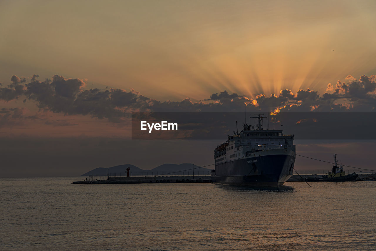 SCENIC VIEW OF SEA DURING SUNSET