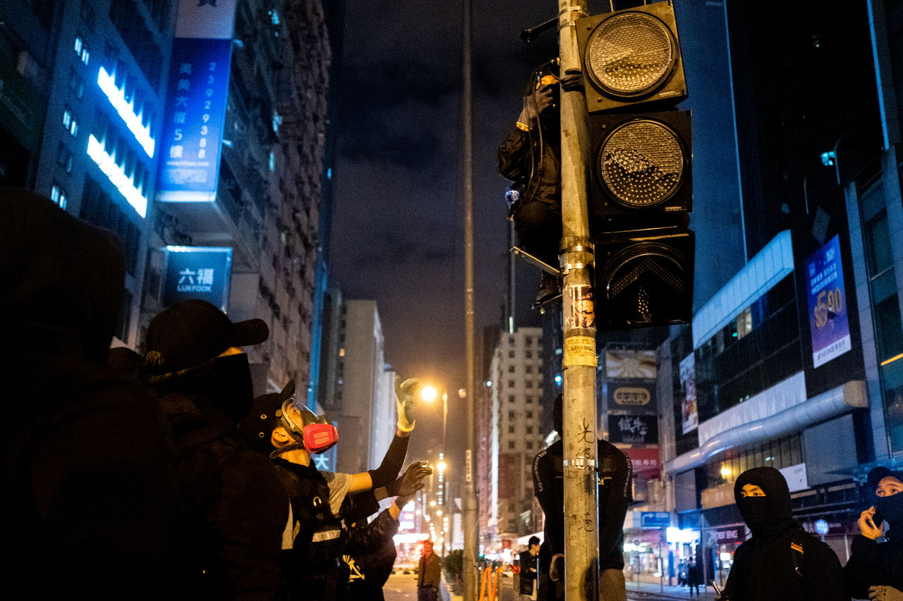 Low angle view of illuminated street at night