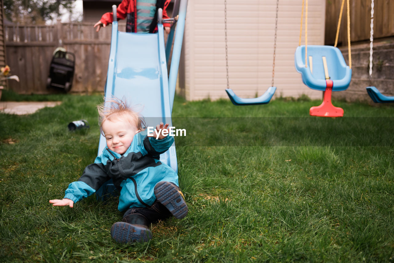 Boy playing on grass