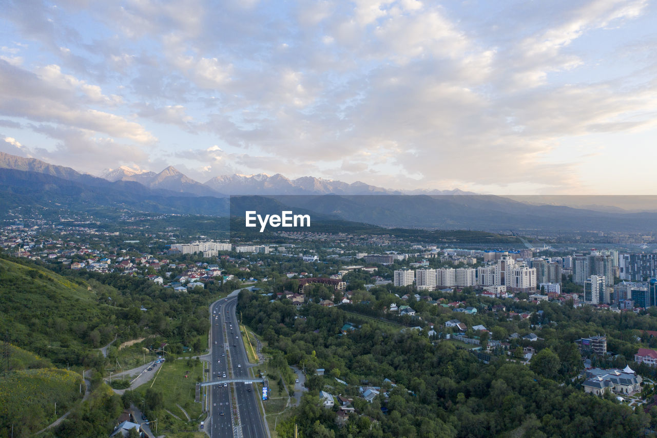 High angle view of buildings in city against sky