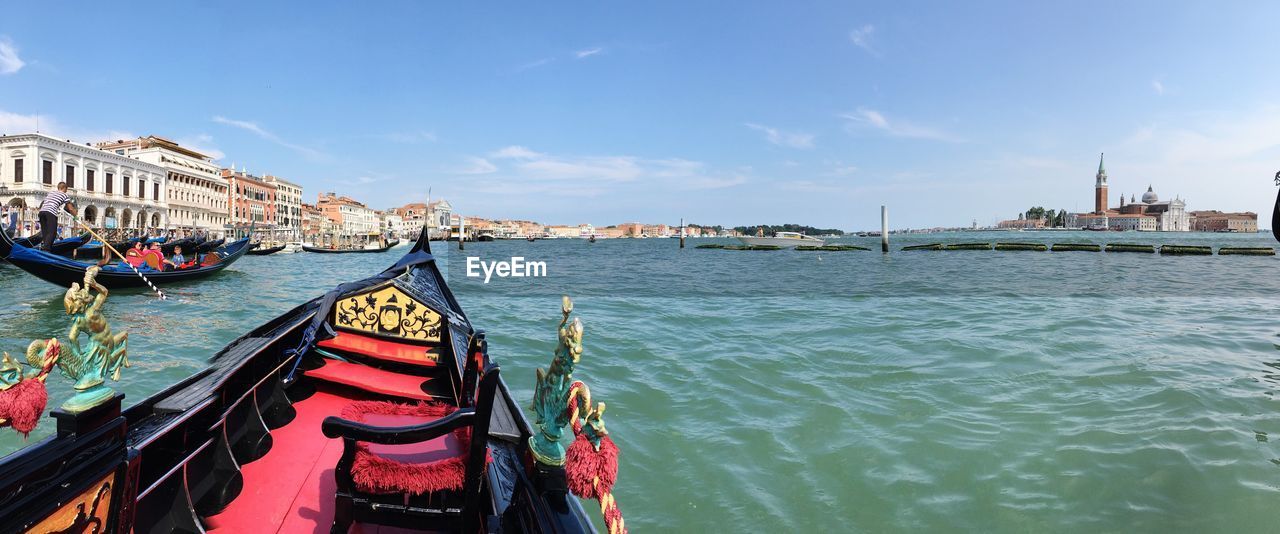 VIEW OF BOATS IN SEA